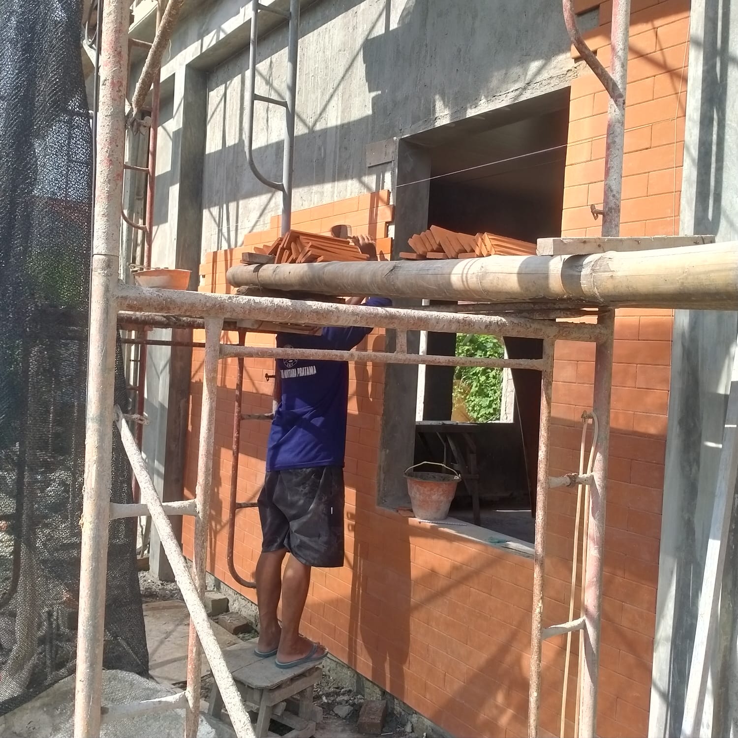 Pemasangan bata Tempel